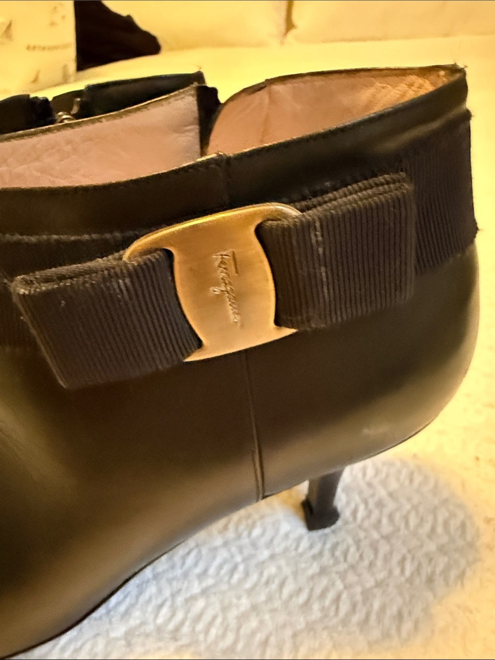 Salvatore Ferragamo Black Leather Ankle Boots with Grosgrain Bow and Gold Plaque